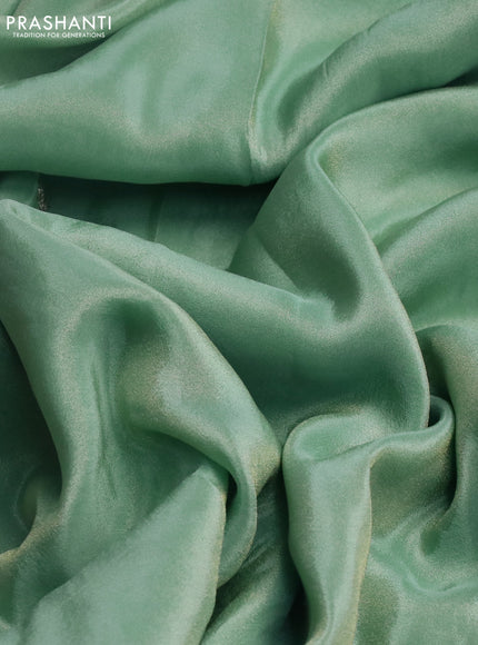 Tissue silk saree teal blue with gotapatti work buttas and gottapatti lace work border