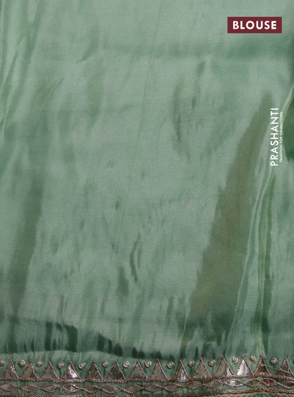 Tissue silk saree teal blue with gotapatti work buttas and gottapatti lace work border