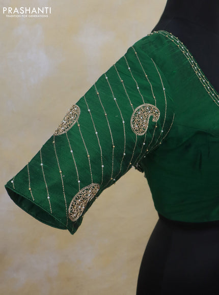 Raw silk readymade blouse green with simple aari work and back knot