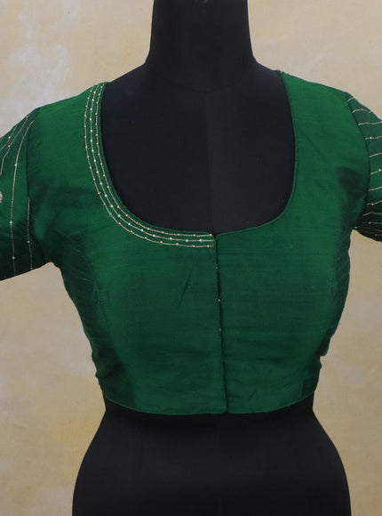 Raw silk readymade blouse green with simple aari work and back knot