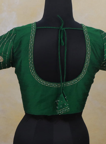Raw silk readymade blouse green with simple aari work and back knot