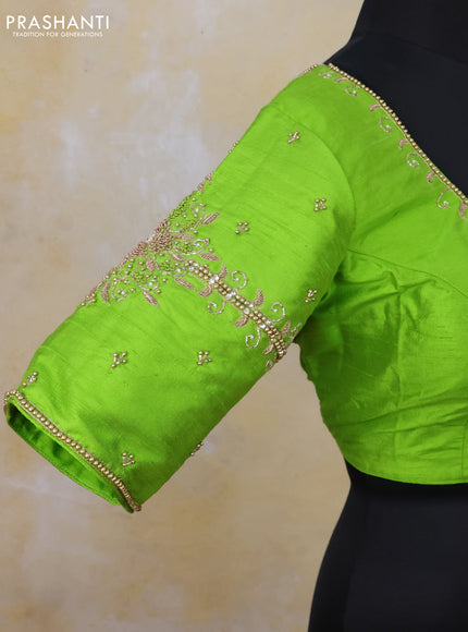 Raw silk readymade blouse light green with zardosi work and back knot