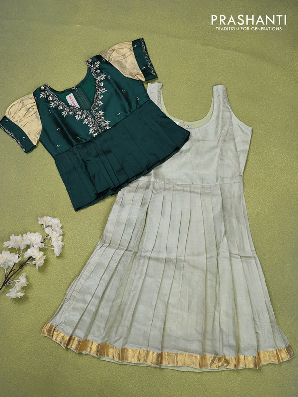 Pure silk kids lehenga dark green and pastel green with beaded work neck pattern pattern and puff sleeve & zari woven border for 4 years