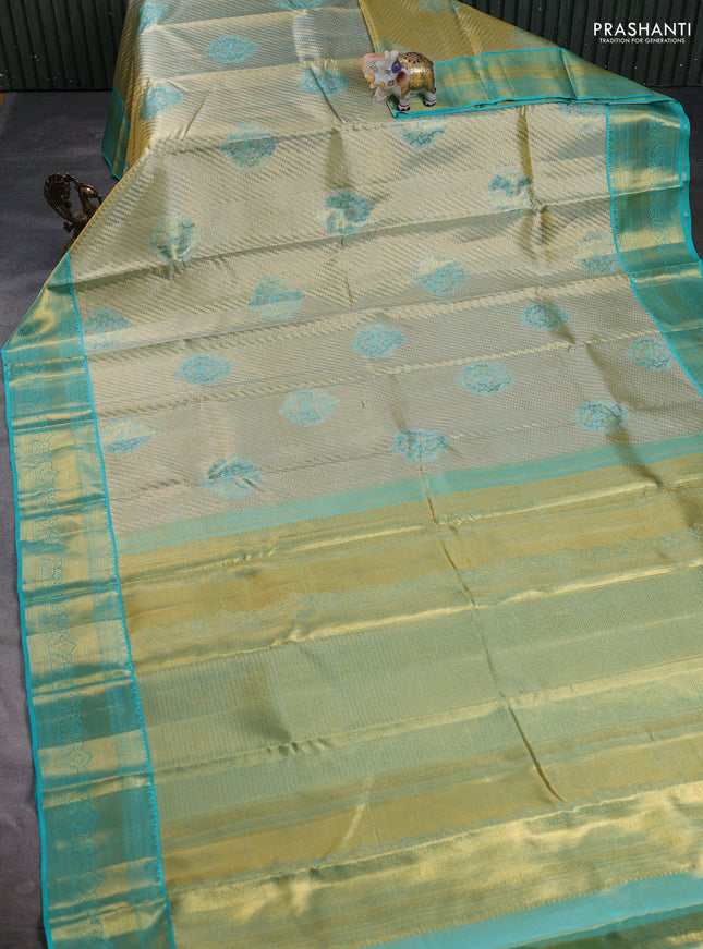 Pure kanchipuram tissue silk saree gold and teal blue with allover zari woven brocade weaves and rich zari woven border
