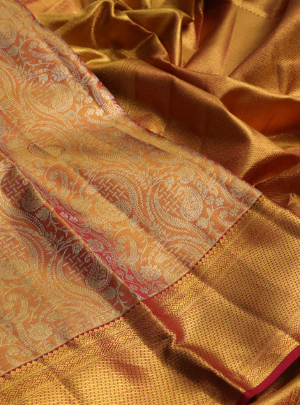 Pure kanchipuram tissue silk saree gold and maroon with allover zari woven brocade weaves and rich zari woven border