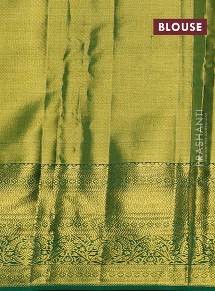 Pure kanchipuram tissue silk saree light green and green with allover zari woven brocade weaves and rich zari woven border