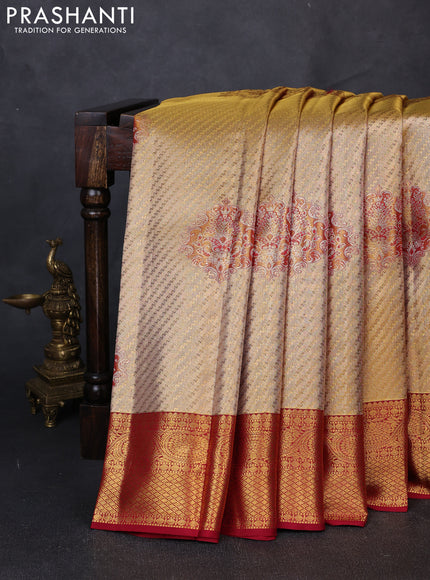 Pure kanchipuram tissue silk saree gold and maroon with allover zari woven brocade weaves and rich zari woven border