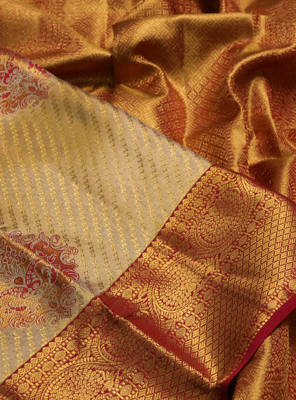 Pure kanchipuram tissue silk saree gold and maroon with allover zari woven brocade weaves and rich zari woven border