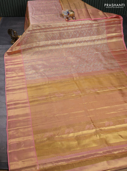 Pure kanchipuram tissue silk saree golden peach with allover zari woven floral brocade weaves and rich zari woven border