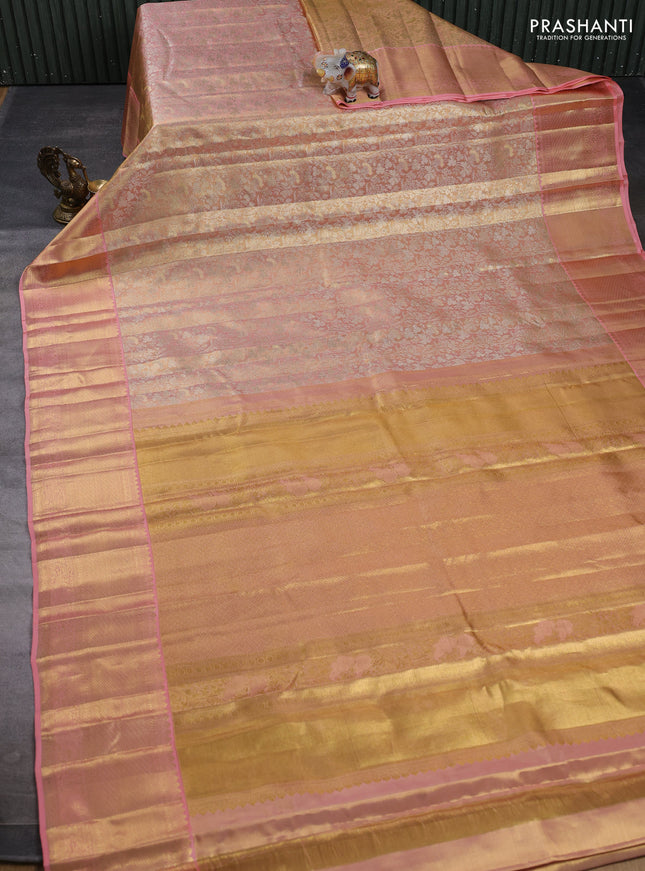 Pure kanchipuram tissue silk saree golden peach with allover zari woven floral brocade weaves and rich zari woven border
