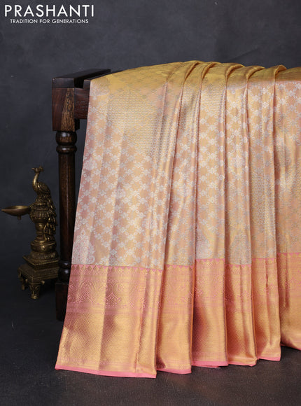 Pure kanchipuram tissue silk saree mild peach and peach with allover silver zari woven brocade weaves and rich zari woven border