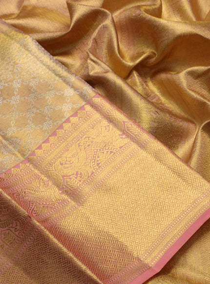 Pure kanchipuram tissue silk saree mild peach and peach with allover silver zari woven brocade weaves and rich zari woven border