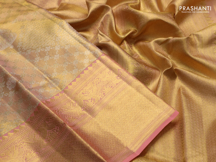 Pure kanchipuram tissue silk saree mild peach and peach with allover silver zari woven brocade weaves and rich zari woven border