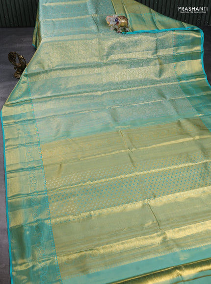 Pure kanchipuram tissue silk saree dual shade of teal and teal blue with allover zari woven brocade weaves and rich zari woven border