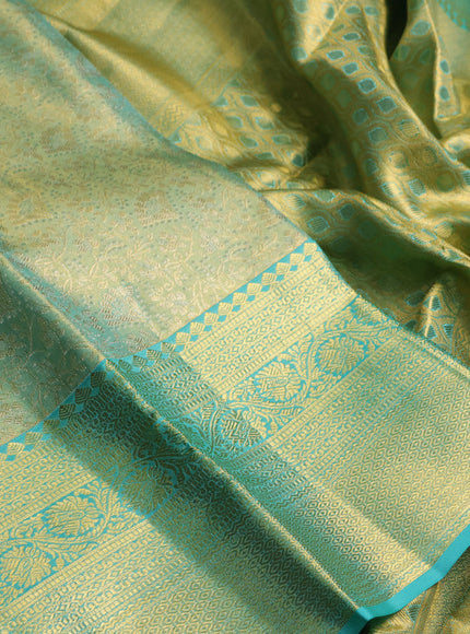 Pure kanchipuram tissue silk saree dual shade of teal and teal blue with allover zari woven brocade weaves and rich zari woven border