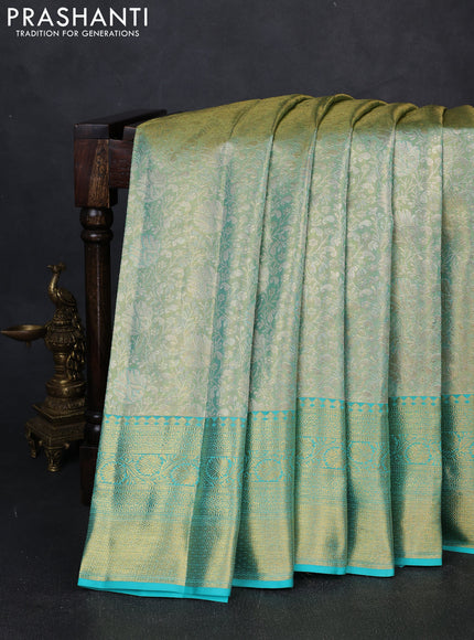 Pure kanchipuram tissue silk saree dual shade of teal and teal blue with allover zari woven brocade weaves and rich zari woven border