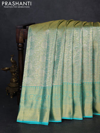 Pure kanchipuram tissue silk saree dual shade of teal and teal blue with allover zari woven brocade weaves and rich zari woven border