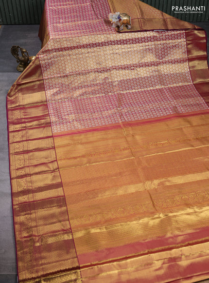 Pure kanchipuram tissue silk saree dual shade of gold and wine shade with allover zari woven brocade weaves and long rich zari woven border