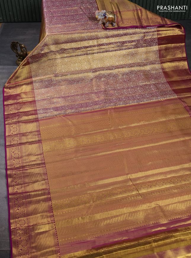 Pure kanchipuram tissue silk saree dual shade of gold and purple with allover zari woven brocade weaves and long rich zari woven border