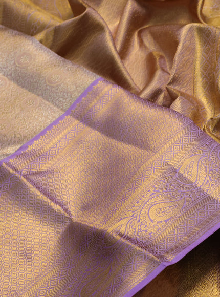 Pure kanchipuram tissue silk saree dual shade of mild lavender and lavender with allover zari woven brocade weaves and long rich zari woven border