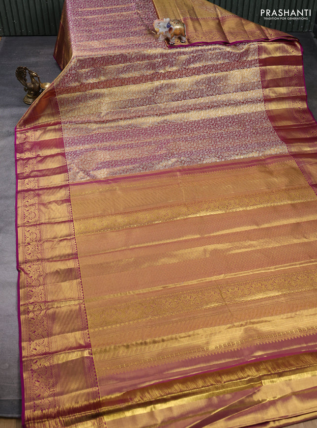 Pure kanchipuram tissue silk saree dual shade of gold and purple with allover zari woven brocade weaves and long rich zari woven border