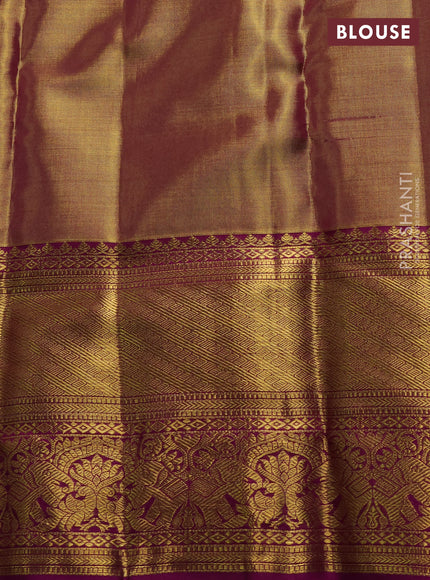 Pure kanchipuram tissue silk saree dual shade of gold and purple with allover zari woven brocade weaves and long rich zari woven border