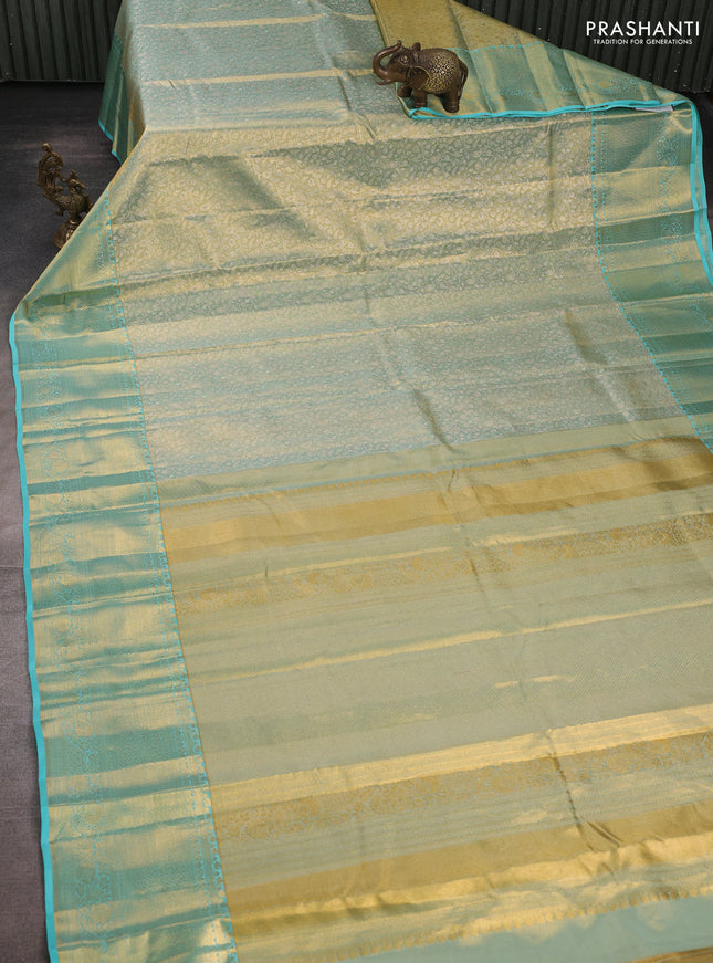 Pure kanchipuram tissue silk saree dual shade of teal and teal blue with allover zari woven brocade weaves and long rich zari woven border
