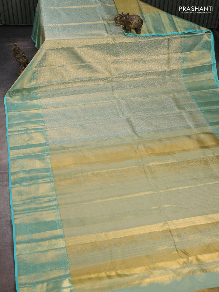 Pure kanchipuram tissue silk saree dual shade of teal and teal blue with allover zari woven brocade weaves and long rich zari woven border