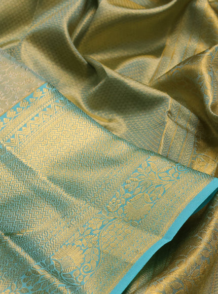 Pure kanchipuram tissue silk saree dual shade of teal and teal blue with allover zari woven brocade weaves and long rich zari woven border