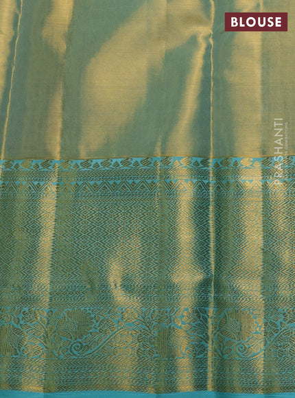 Pure kanchipuram tissue silk saree dual shade of teal and teal blue with allover zari woven brocade weaves and long rich zari woven border