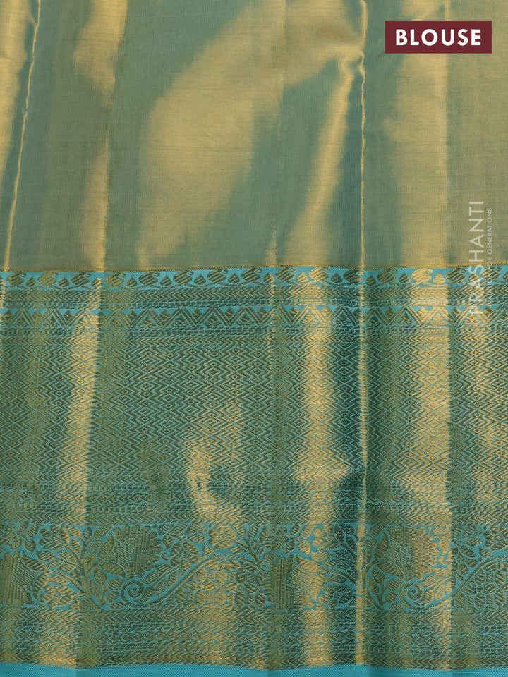 Pure kanchipuram tissue silk saree dual shade of teal and teal blue with allover zari woven brocade weaves and long rich zari woven border