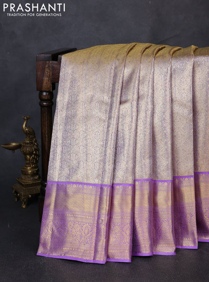 Pure kanchipuram tissue silk saree dual shade of lavender with allover zari woven brocade weaves and rich zari woven border