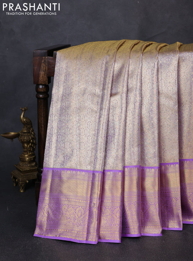 Pure kanchipuram tissue silk saree dual shade of lavender with allover zari woven brocade weaves and rich zari woven border