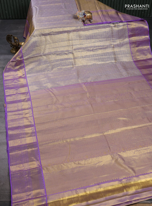Pure kanchipuram tissue silk saree dual shade of lavender with allover zari woven brocade weaves and rich zari woven border