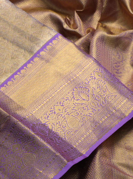 Pure kanchipuram tissue silk saree dual shade of lavender with allover zari woven brocade weaves and rich zari woven border