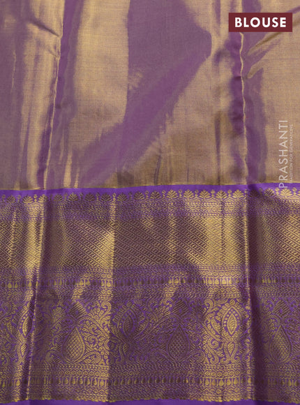 Pure kanchipuram tissue silk saree dual shade of lavender with allover zari woven brocade weaves and rich zari woven border