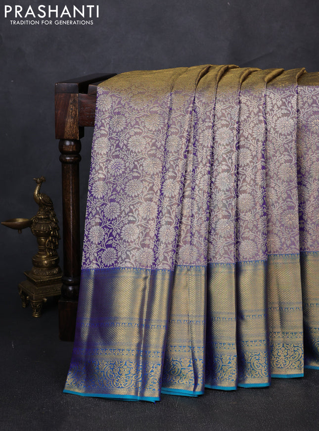 Pure kanchipuram tissue silk saree dual shade of lavender and dual shade of teal blue with allover zari woven brocade weaves and long rich zari woven border