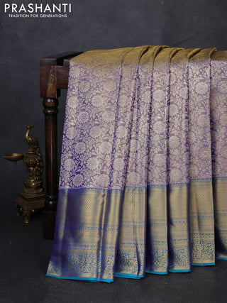 Pure kanchipuram tissue silk saree dual shade of lavender and dual shade of teal blue with allover zari woven brocade weaves and long rich zari woven border