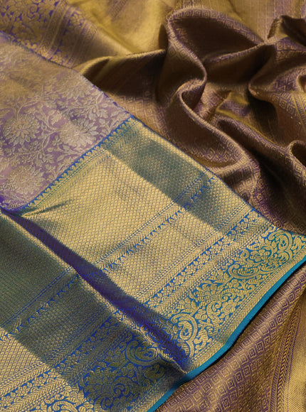 Pure kanchipuram tissue silk saree dual shade of lavender and dual shade of teal blue with allover zari woven brocade weaves and long rich zari woven border