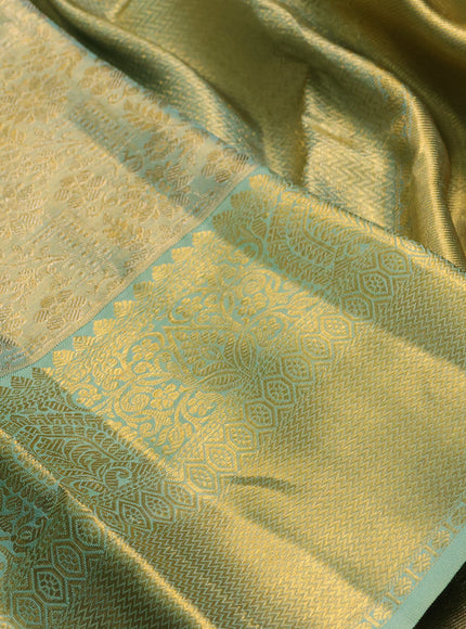 Pure kanchipuram tissue silk saree dual shade of teal with allover zari woven brocade weaves and rich zari woven border