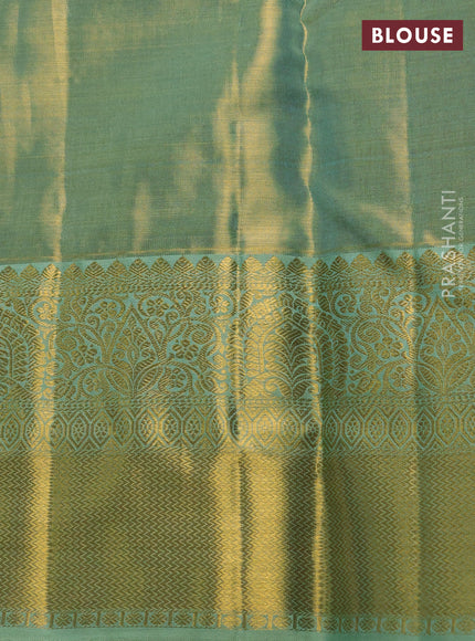 Pure kanchipuram tissue silk saree dual shade of teal with allover zari woven brocade weaves and rich zari woven border