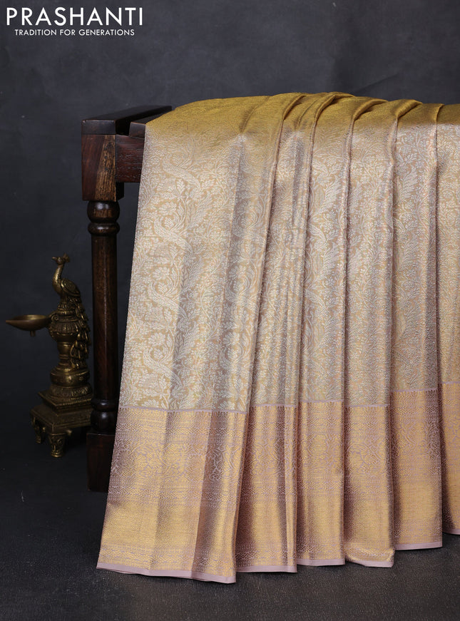 Pure kanchipuram tissue silk saree gold and beige with allover zari woven brocade weaves and rich zari woven border