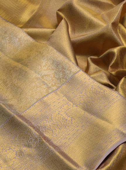 Pure kanchipuram tissue silk saree gold and beige with allover zari woven brocade weaves and rich zari woven border