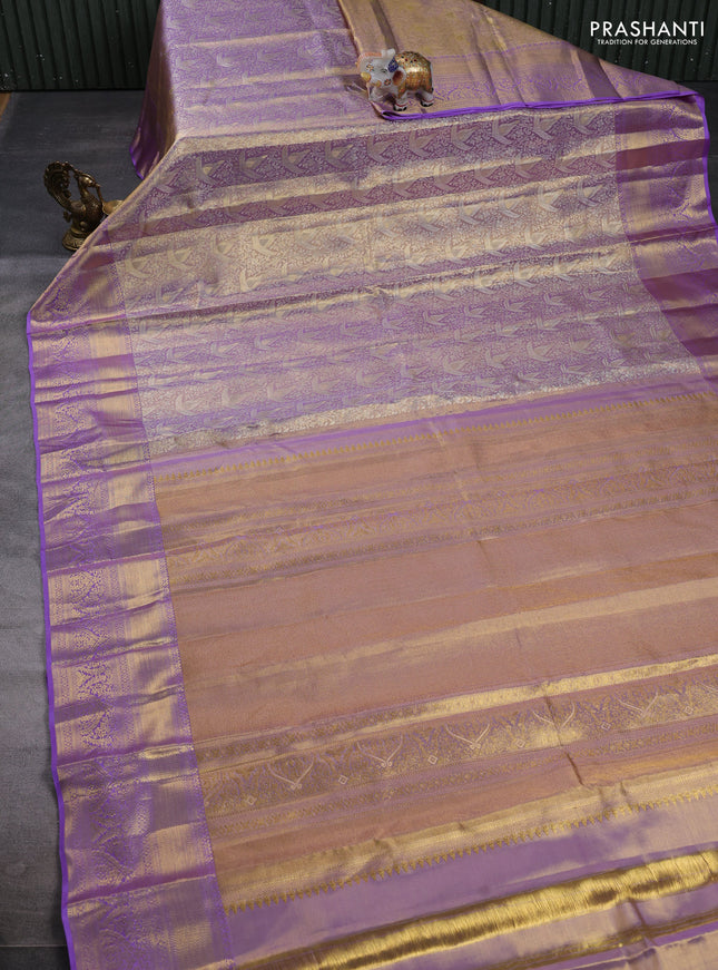 Pure kanchipuram tissue silk saree golden lavender and lavender with allover zari woven brocade weaves and rich zari woven border