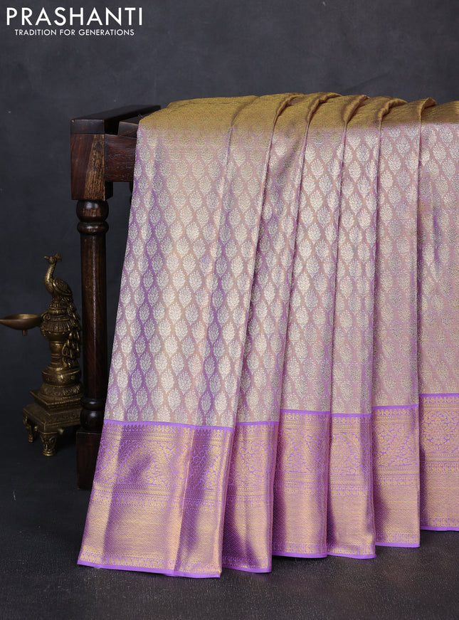 Pure kanchipuram tissue silk saree dual shade of lavender with allover zari woven brocade weaves and rich zari woven border