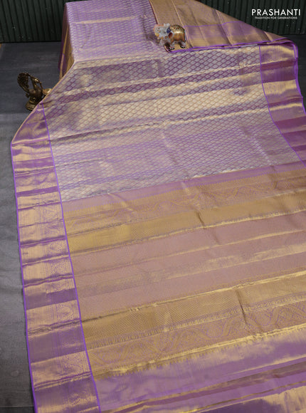Pure kanchipuram tissue silk saree dual shade of lavender with allover zari woven brocade weaves and rich zari woven border