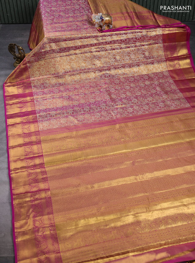 Pure kanchipuram tissue silk saree dual shade of golden pink and magenta pink with allover zari woven floral brocade weaves and long rich zari woven border