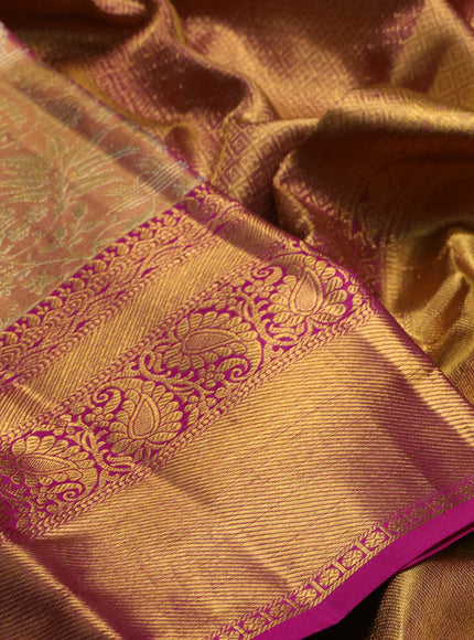Pure kanchipuram tissue silk saree dual shade of golden pink and magenta pink with allover zari woven floral brocade weaves and long rich zari woven border