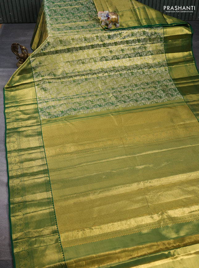 Pure kanchipuram tissue silk saree light green and green with allover zari woven brocade weaves and long rich zari woven border