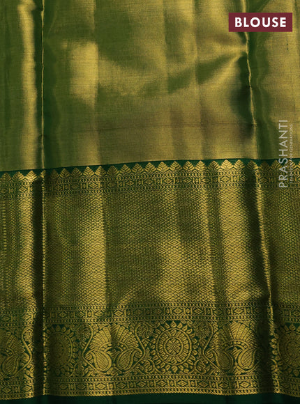 Pure kanchipuram tissue silk saree light green and green with allover zari woven brocade weaves and long rich zari woven border